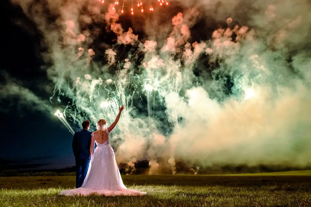 image of a wedding couple watching a firework display